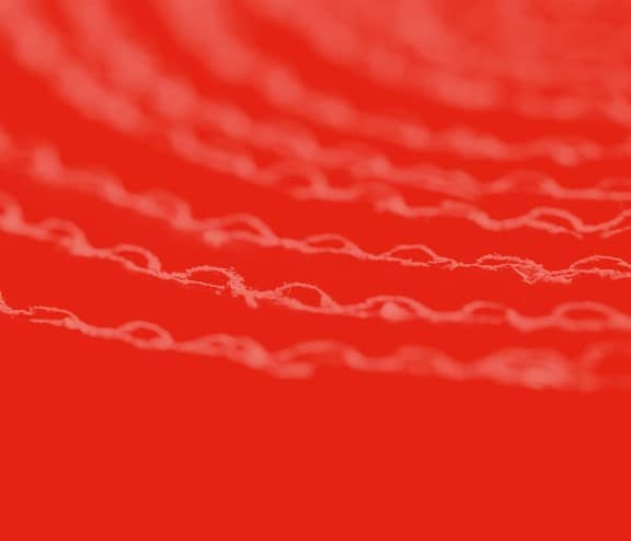 Cardboard textured background with red overlay