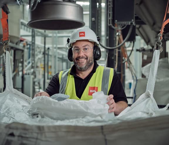 Happy Biffa employee having his picture taken after Biffa named very good place to work in major employee survey
