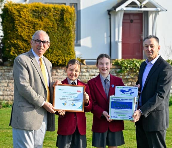 Children from Cumbria getting an award for helping to prevent fires by saving 2 tonnes of household waste
