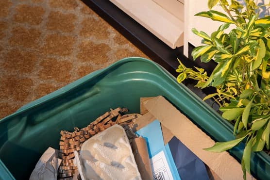 Cardboard waste in green bin