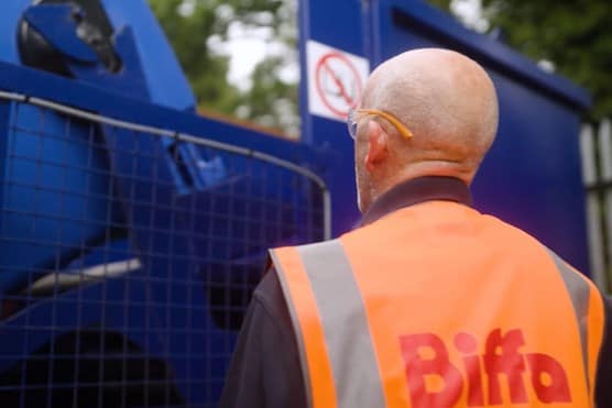 Biffa employee looking at equipment